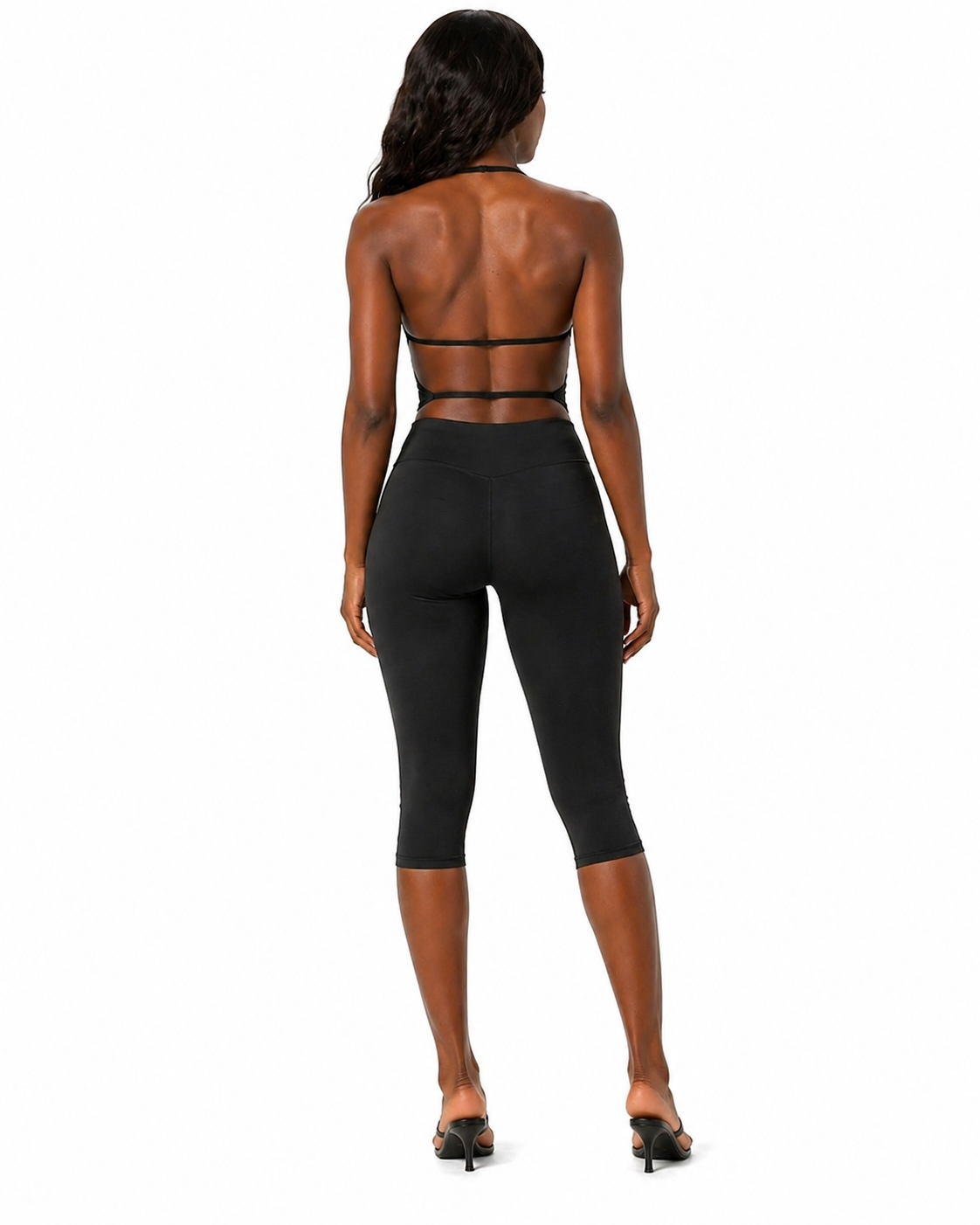 Black backless strappy crop top and high-waist capri leggings set, open back straps