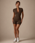 Brown women’s sculpting romper, front zip V-neck, short sleeves, fitted shorts