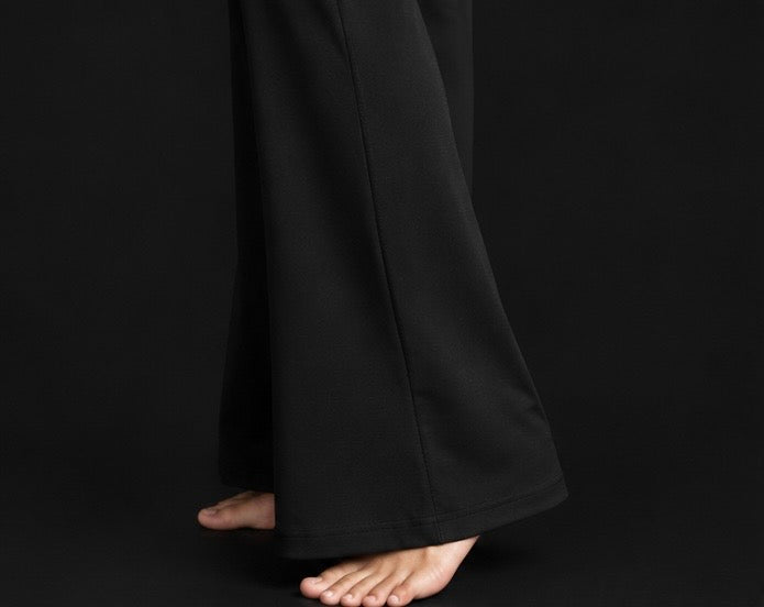 Dark flared pants with wide leg opening and straight ankle-length hem